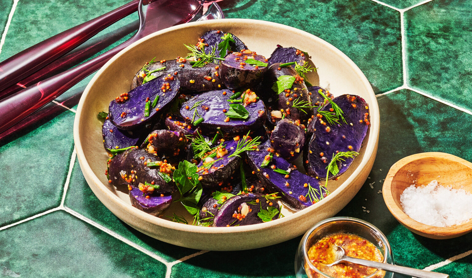 Bowl with purple fingerling potato salad.